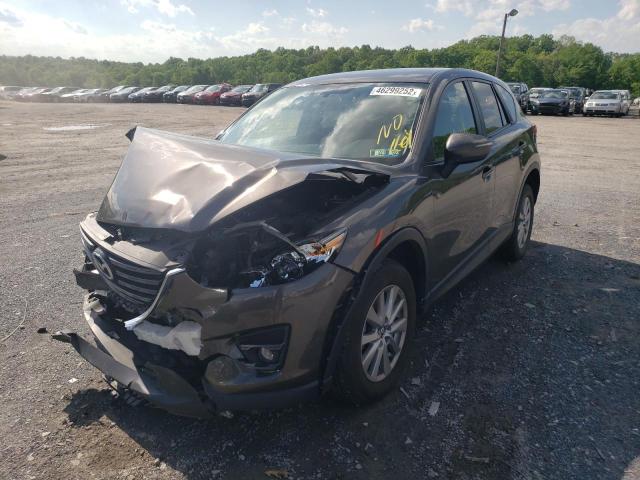 Photo 2 from auction – 2016 MAZDA CX-5 TOURI with VIN JM3KE4CY8G0832898
