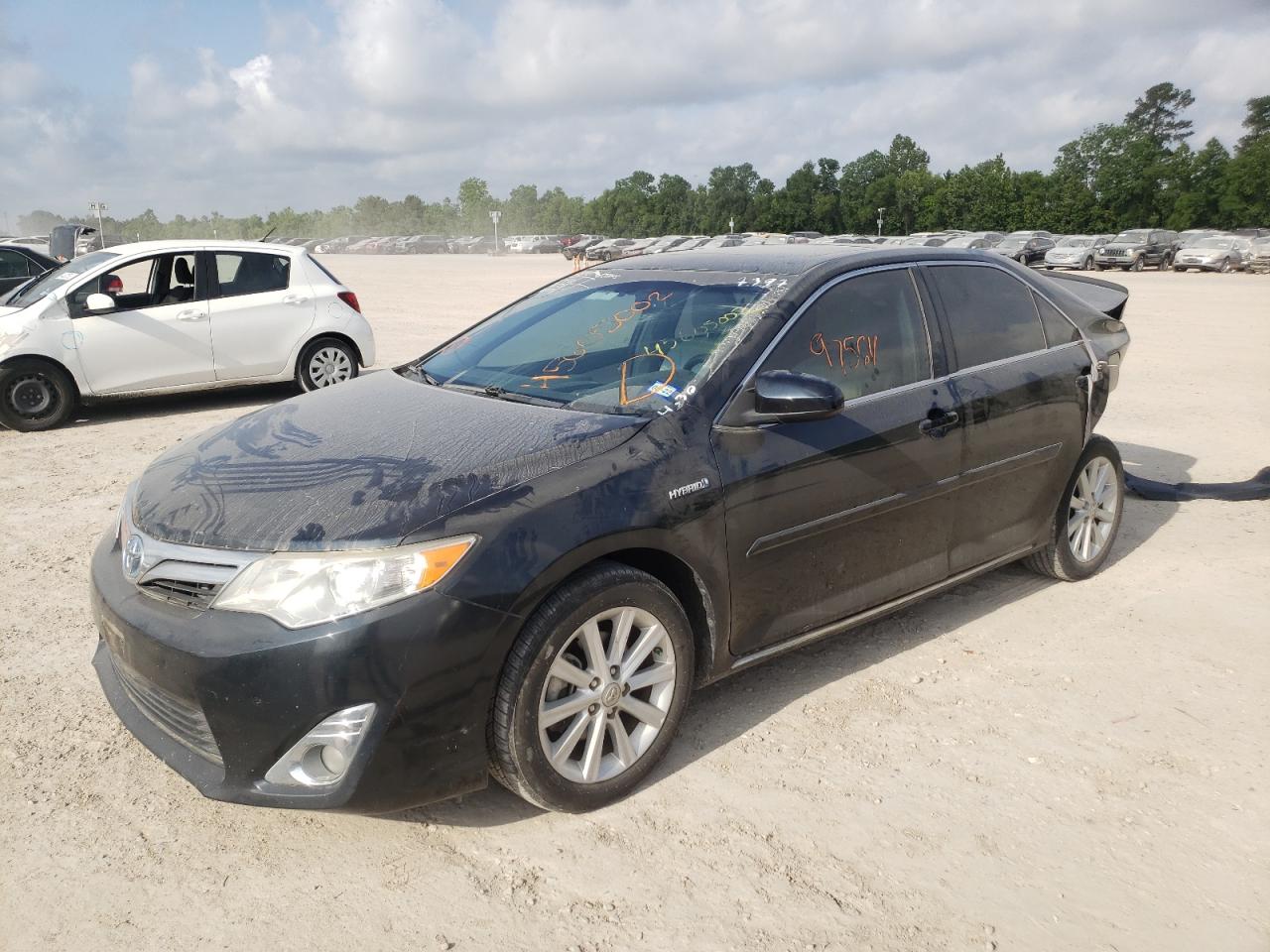 Photo 2 from auction – 2012 TOYOTA CAMRY HYBR with VIN 4T1BD1FK4CU027397