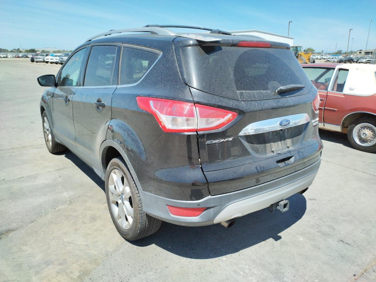 Photo 3 from auction – 2016 FORD ESCAPE TIT with VIN 1FMCU0J96GUC60447