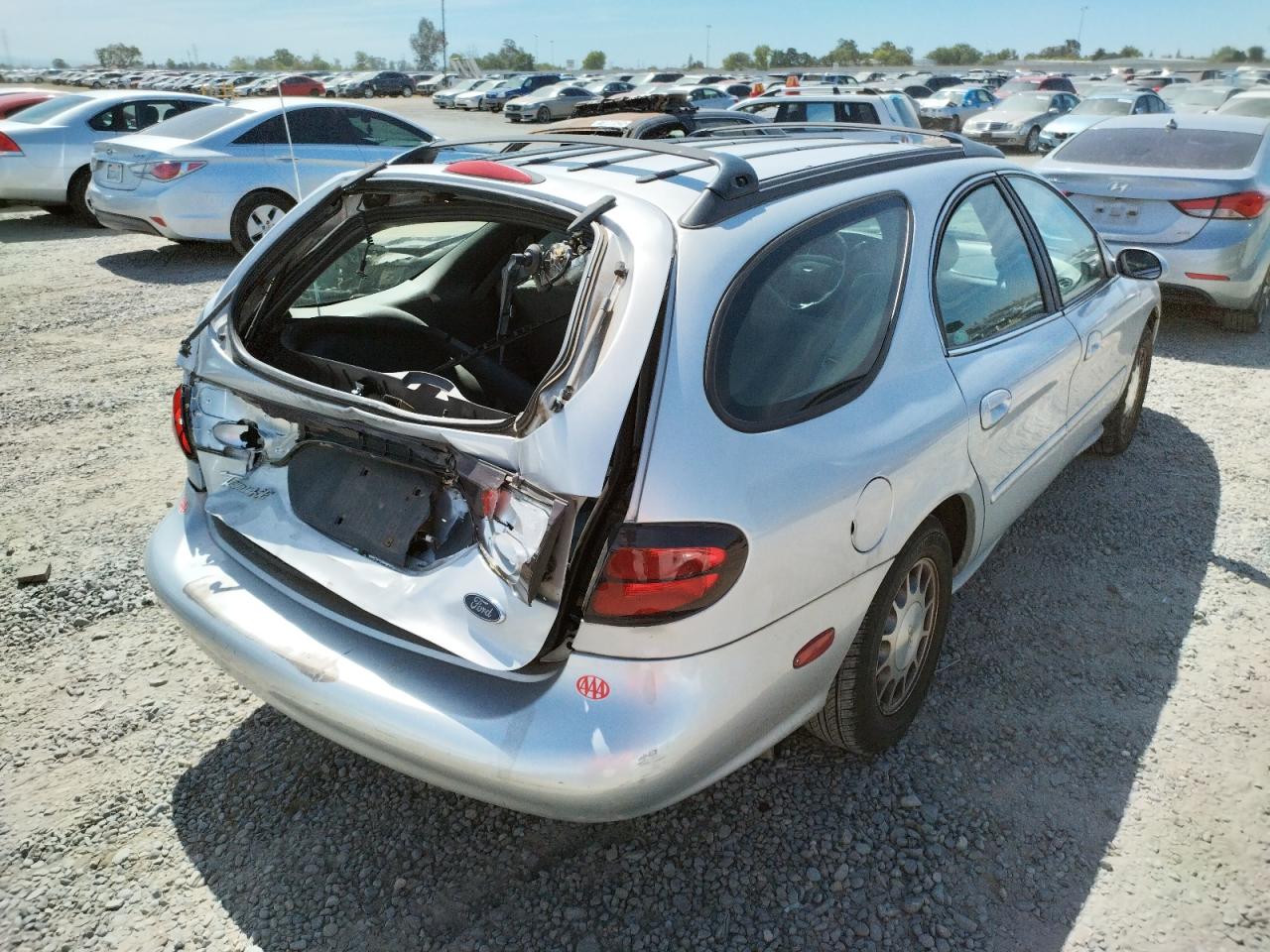 Photo 4 from auction – 1999 FORD TAURUS SE with VIN 1FAFP58S7XA297447