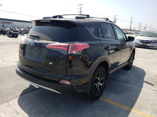 Photo 4 from auction – 2018 TOYOTA RAV4 SE with VIN 2T3NFREV0JW505045