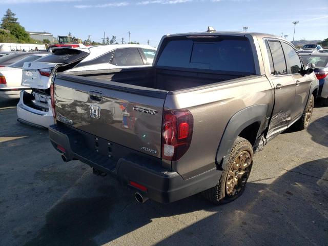 Photo 4 from auction – 2022 HONDA RIDGELINE with VIN 5FPYK3F59NB000449