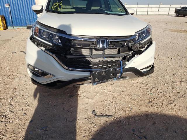 Photo 9 from auction – 2015 HONDA CR-V TOURI with VIN 5J6RM3H98FL023396