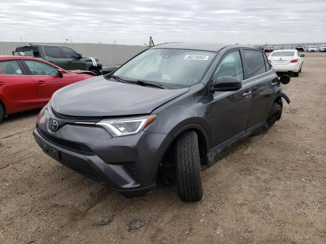 Photo 2 from auction – 2018 TOYOTA RAV4 LE with VIN 2T3ZFREV1JW451563