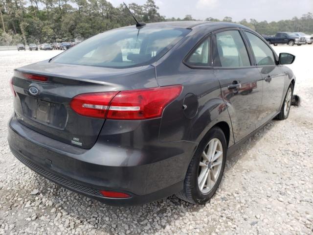 Photo 4 from auction – 2018 FORD FOCUS SE with VIN 1FADP3FE2JL216407