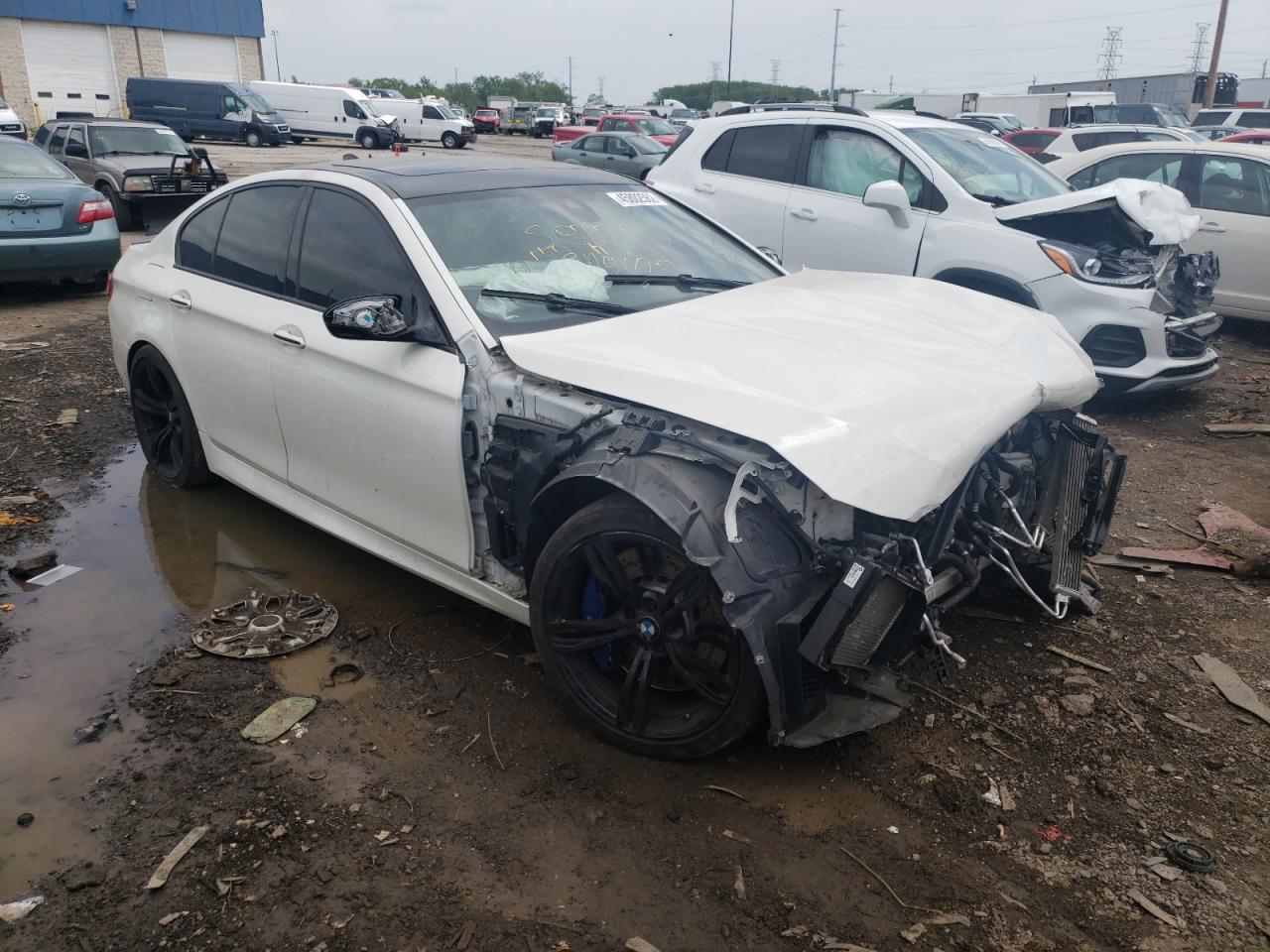 BMW M5 2014 with VIN WBSFV9C5XED593527 - Photo from auction