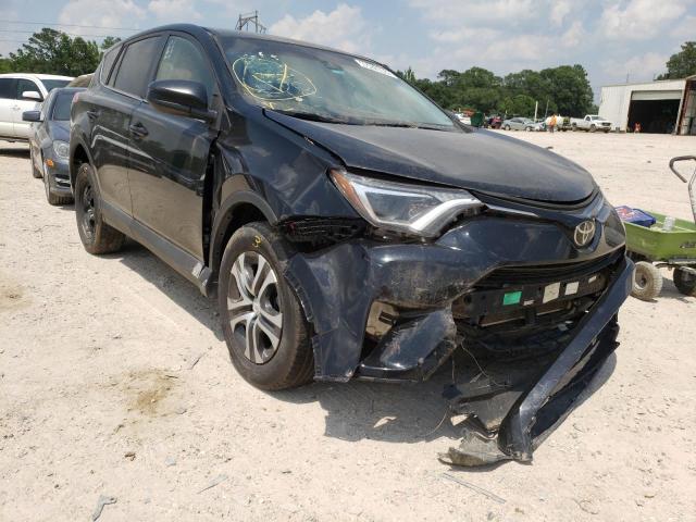 Photo 1 from auction – 2018 TOYOTA RAV4 LE with VIN 2T3ZFREV1JW422452