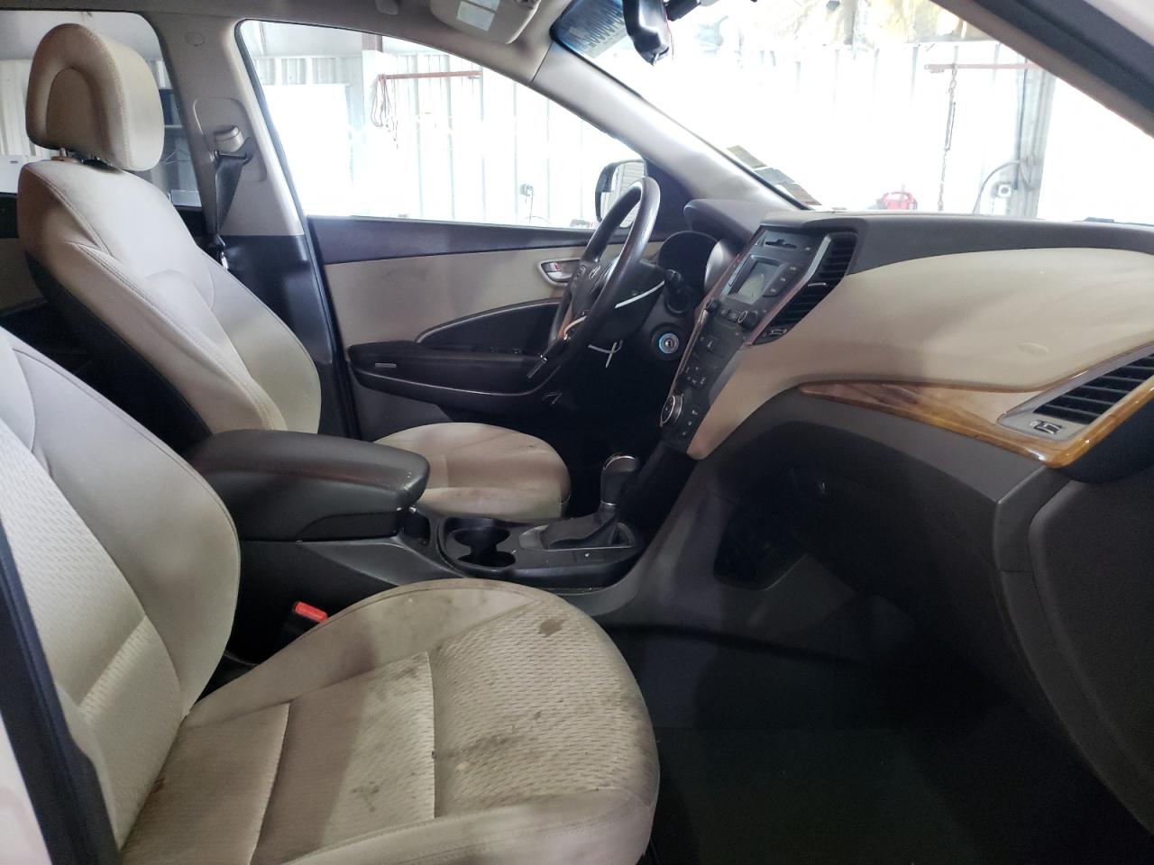 Photo 5 from auction – 2016 HYUNDAI SANTA FE S with VIN KM8SMDHF1GU135340