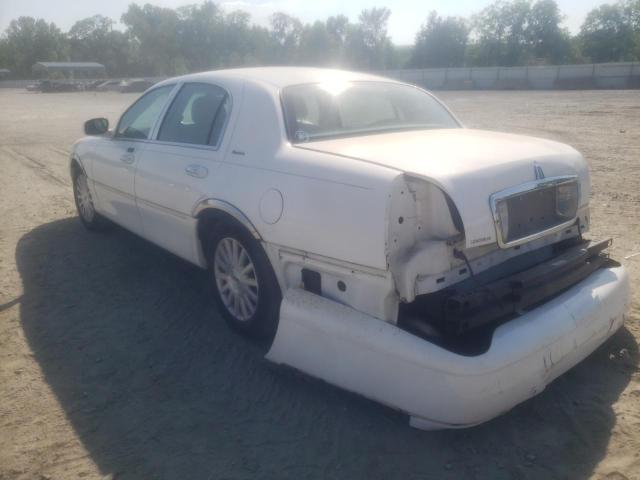 Photo 3 from auction – 2004 LINCOLN TOWN CAR E with VIN 1LNHM81W14Y609433