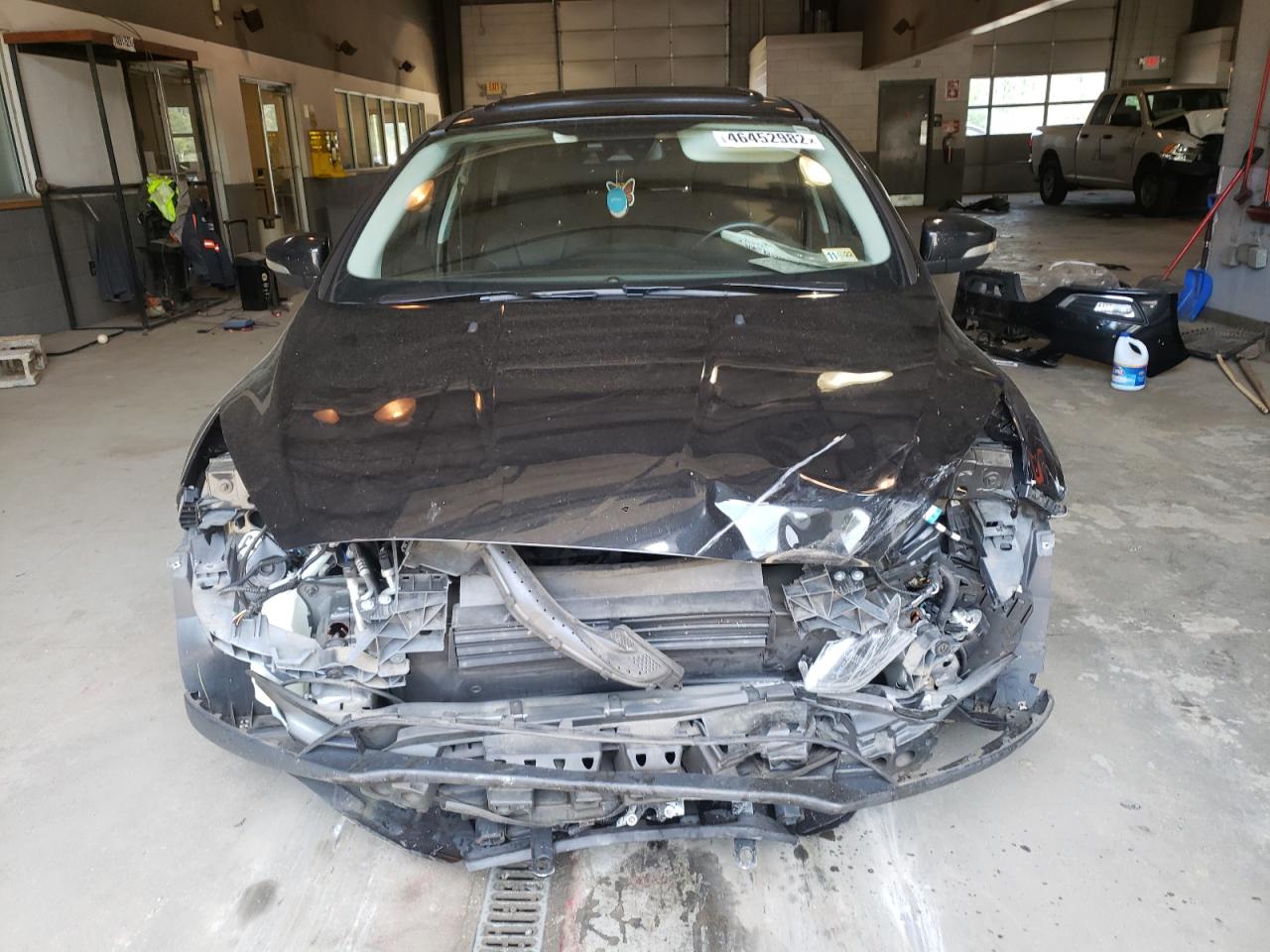 Photo 9 from auction – 2015 FORD FOCUS TITA with VIN 1FADP3N23FL267977