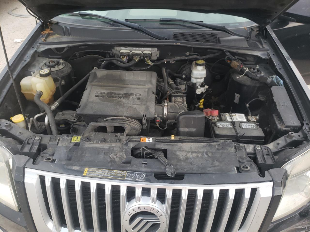 Photo 7 from auction – 2010 MERCURY MARINER PR with VIN 4M2CN9HG0AKJ16481