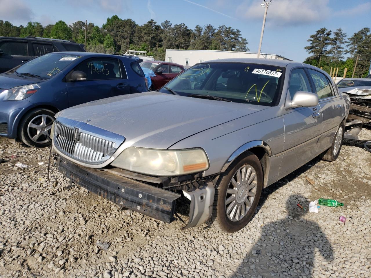 Photo 2 from auction – 2004 LINCOLN TOWN CAR E with VIN 1LNHM81W34Y602175
