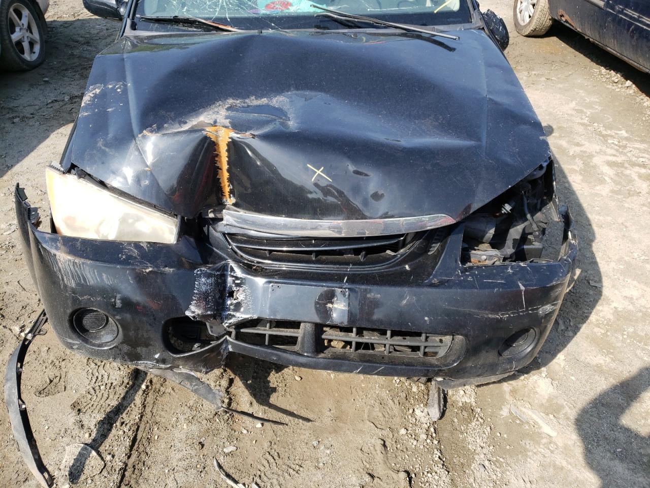 Photo 7 from auction – 2006 KIA SPECTRA LX with VIN KNAFE121665326269