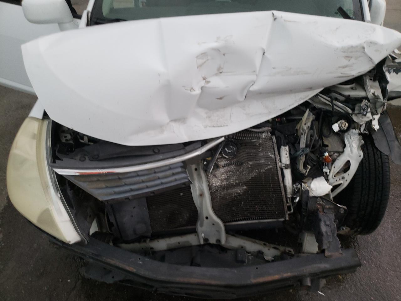 Photo 7 from auction – 2009 NISSAN VERSA S with VIN 3N1BC13E49L449875