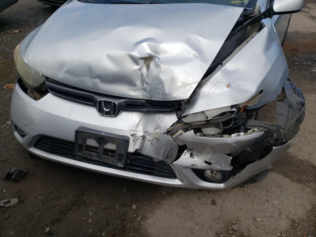 Photo 19 from auction – 2007 HONDA CIVIC EX with VIN 2HGFG11877H517884