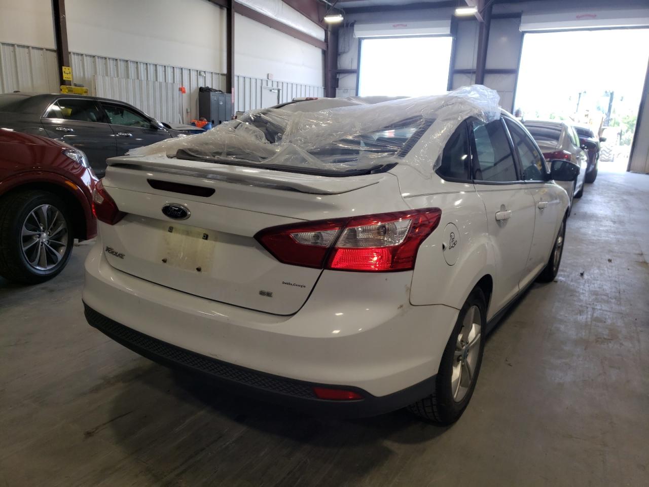 Photo 4 from auction – 2012 FORD FOCUS SE with VIN 1FAHP3F28CL287573