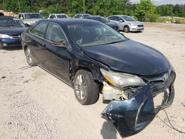 TOYOTA CAMRY LE 2015 with VIN 4T1BF1FK5FU490650 - Photo from auction