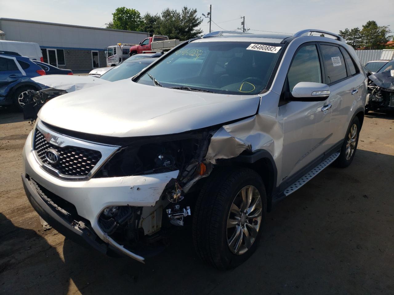Photo 2 from auction – 2011 KIA SORENTO EX with VIN 5XYKUDA20BG182722