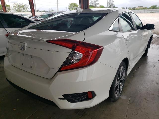 Photo 4 from auction – 2018 HONDA CIVIC EX with VIN 2HGFC1F35JH642009