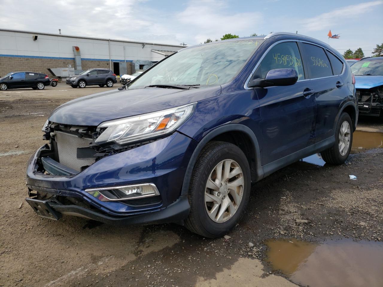 Photo 2 from auction – 2016 HONDA CR-V EXL with VIN 2HKRM4H77GH626324