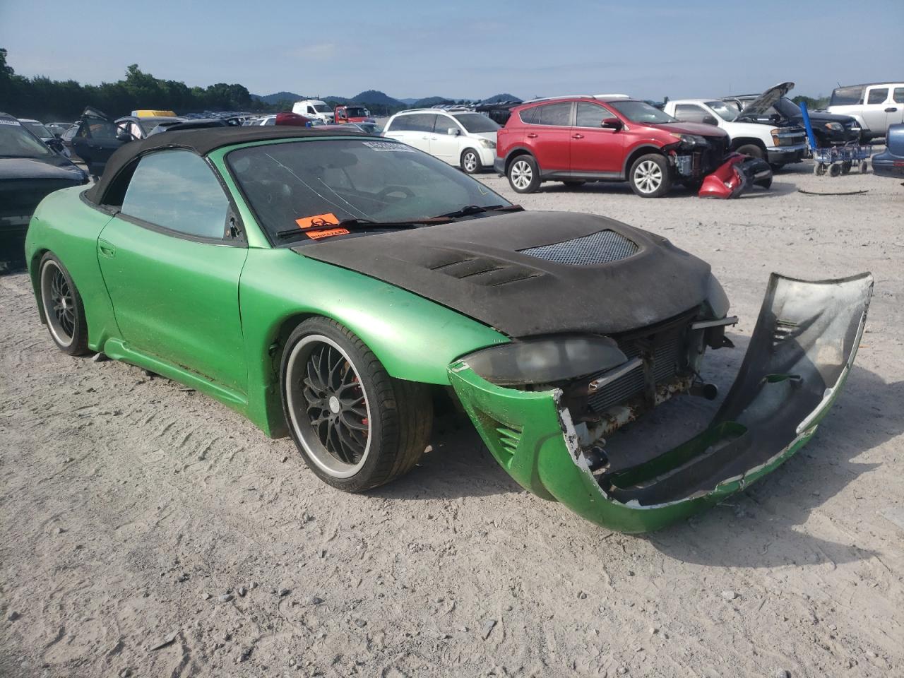 MITSUBISHI ECLIPSE SP 1997 with VIN 4A3AX35GXVE133461 - Photo from auction