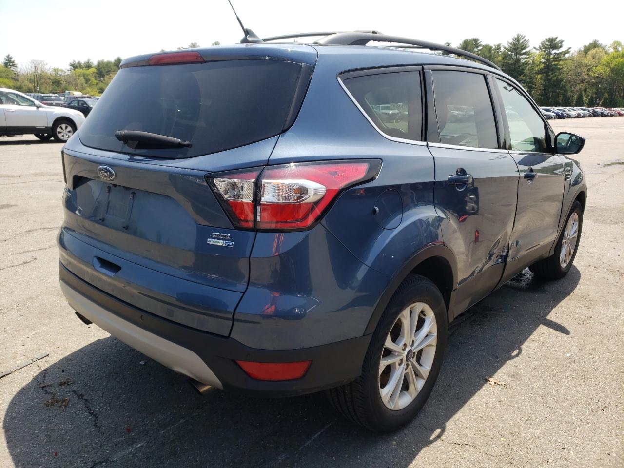 Photo 4 from auction – 2018 FORD ESCAPE SEL with VIN 1FMCU9HD2JUC24941