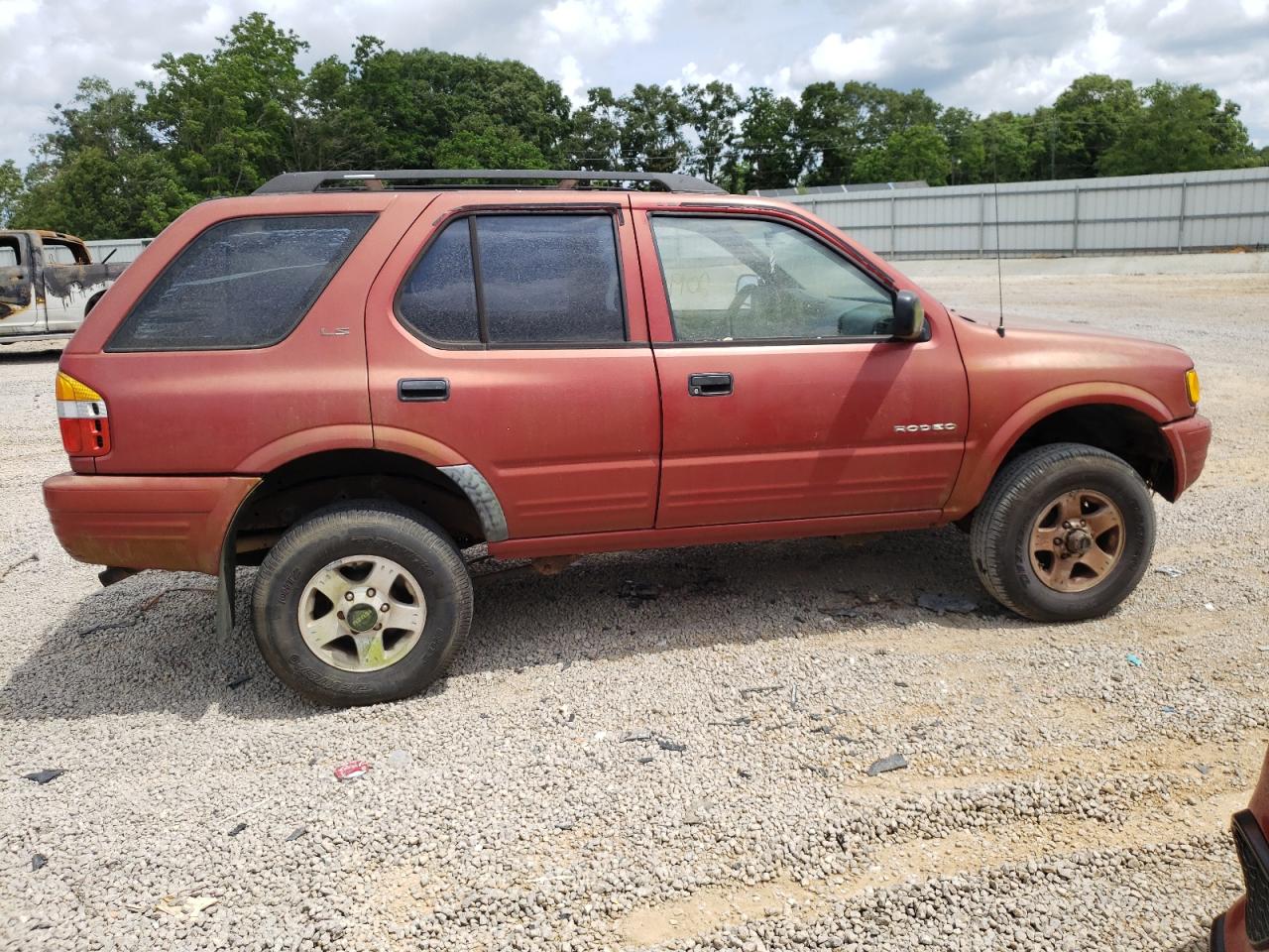 Photo 9 from auction – 1999 ISUZU RODEO S with VIN 4S2CM58W0X4342157