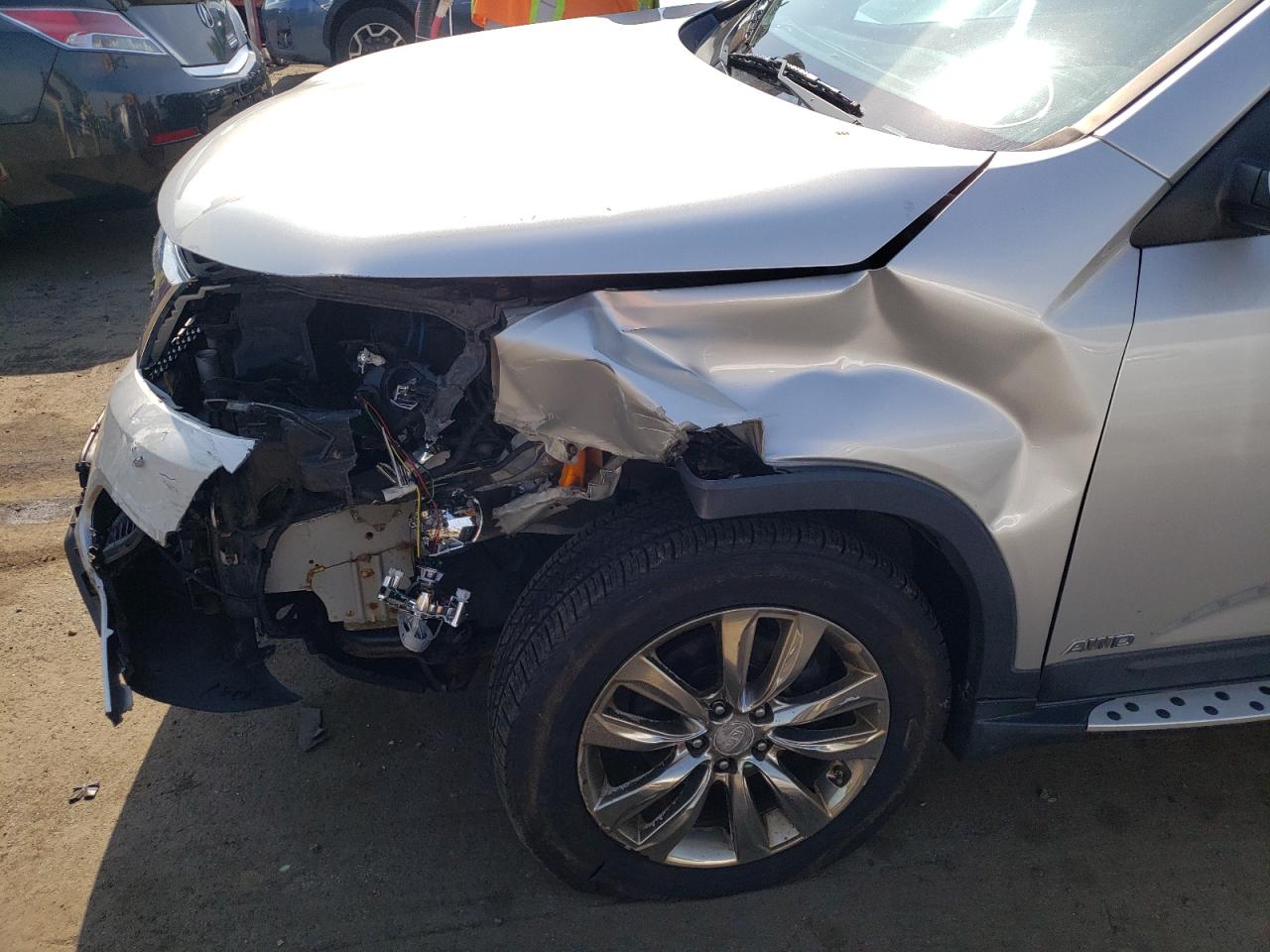 Photo 9 from auction – 2011 KIA SORENTO EX with VIN 5XYKUDA20BG182722