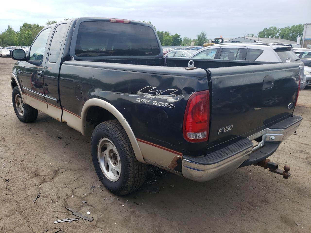 Photo 3 from auction – 2000 FORD F-150 with VIN 1FTRX18L6YNA76313