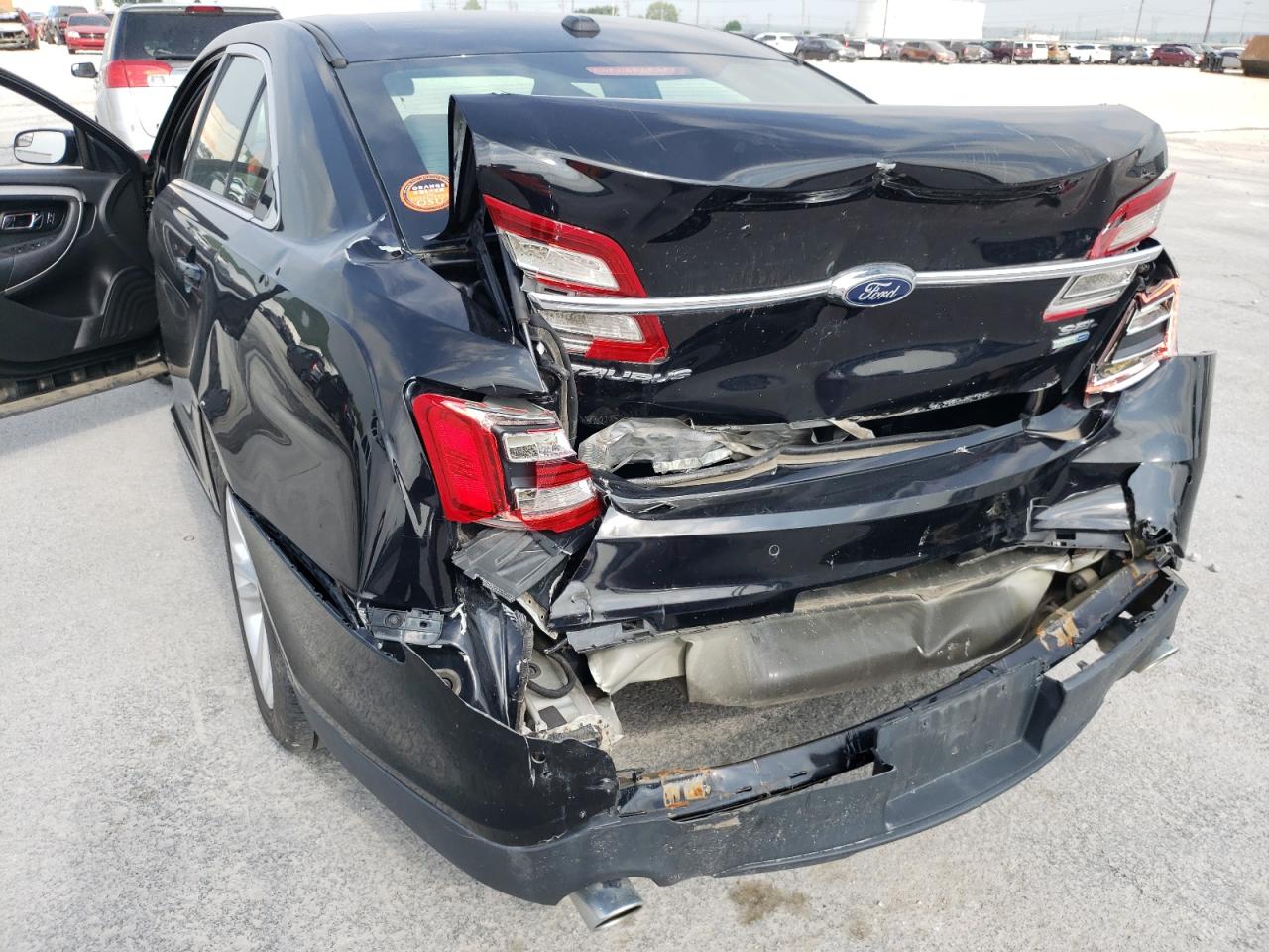 Photo 9 from auction – 2016 FORD TAURUS SEL with VIN 1FAHP2H86GG106951