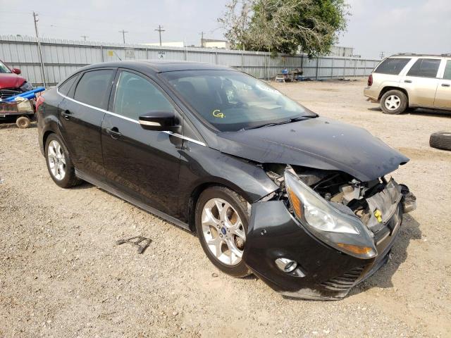 FORD FOCUS TITA 2014 with VIN 1FADP3J2XEL234317 - Photo from auction
