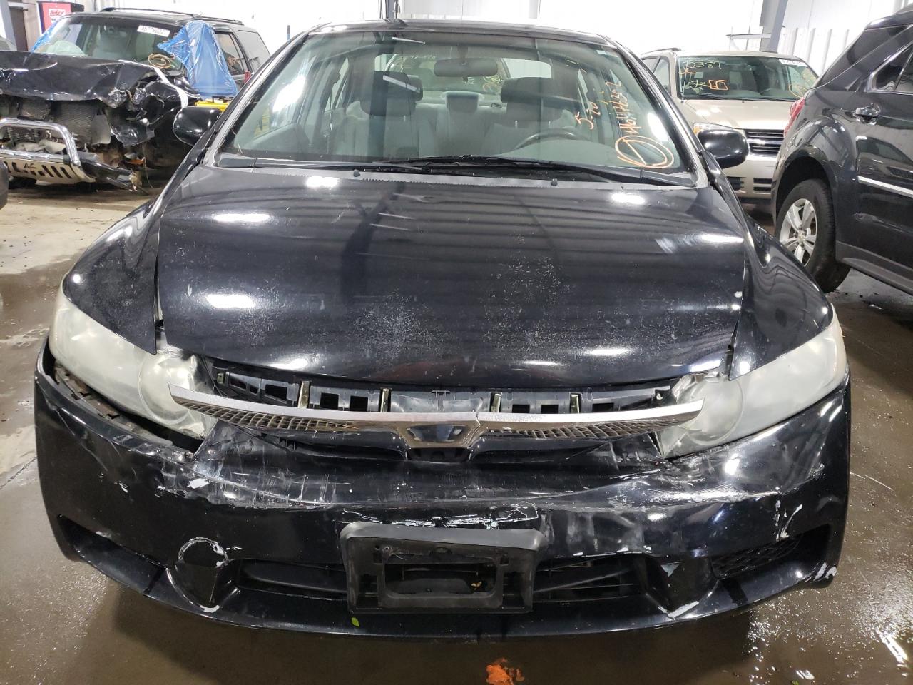 Photo 19 from auction – 2010 HONDA CIVIC LX with VIN 2HGFA1F50AH588674