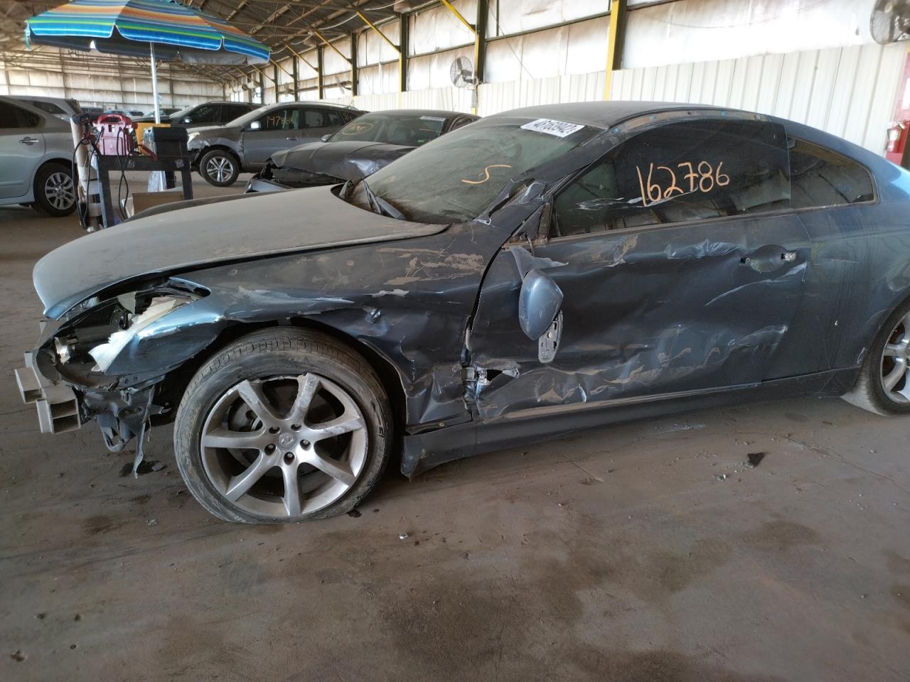 Photo 9 from auction – 2005 INFINITI G35 with VIN JNKCV54E05M418235