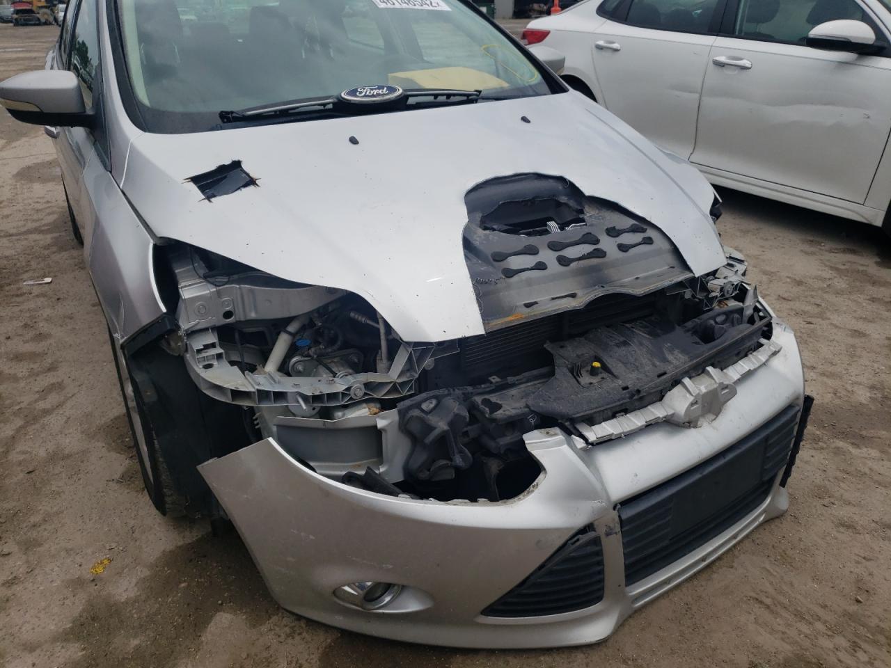 Photo 9 from auction – 2012 FORD FOCUS SE with VIN 1FAHP3F22CL109710
