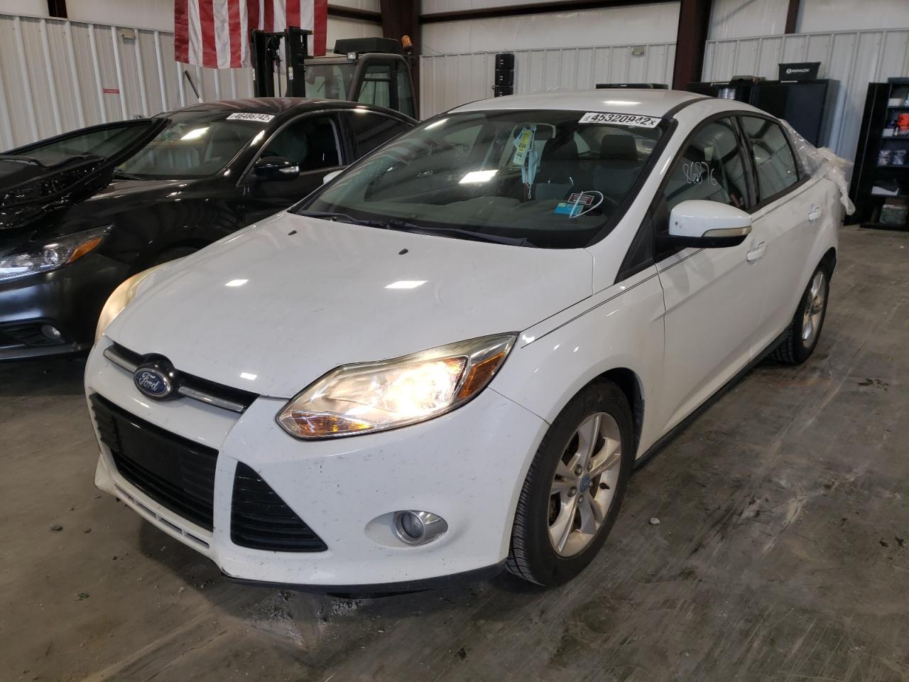 Photo 2 from auction – 2012 FORD FOCUS SE with VIN 1FAHP3F28CL287573
