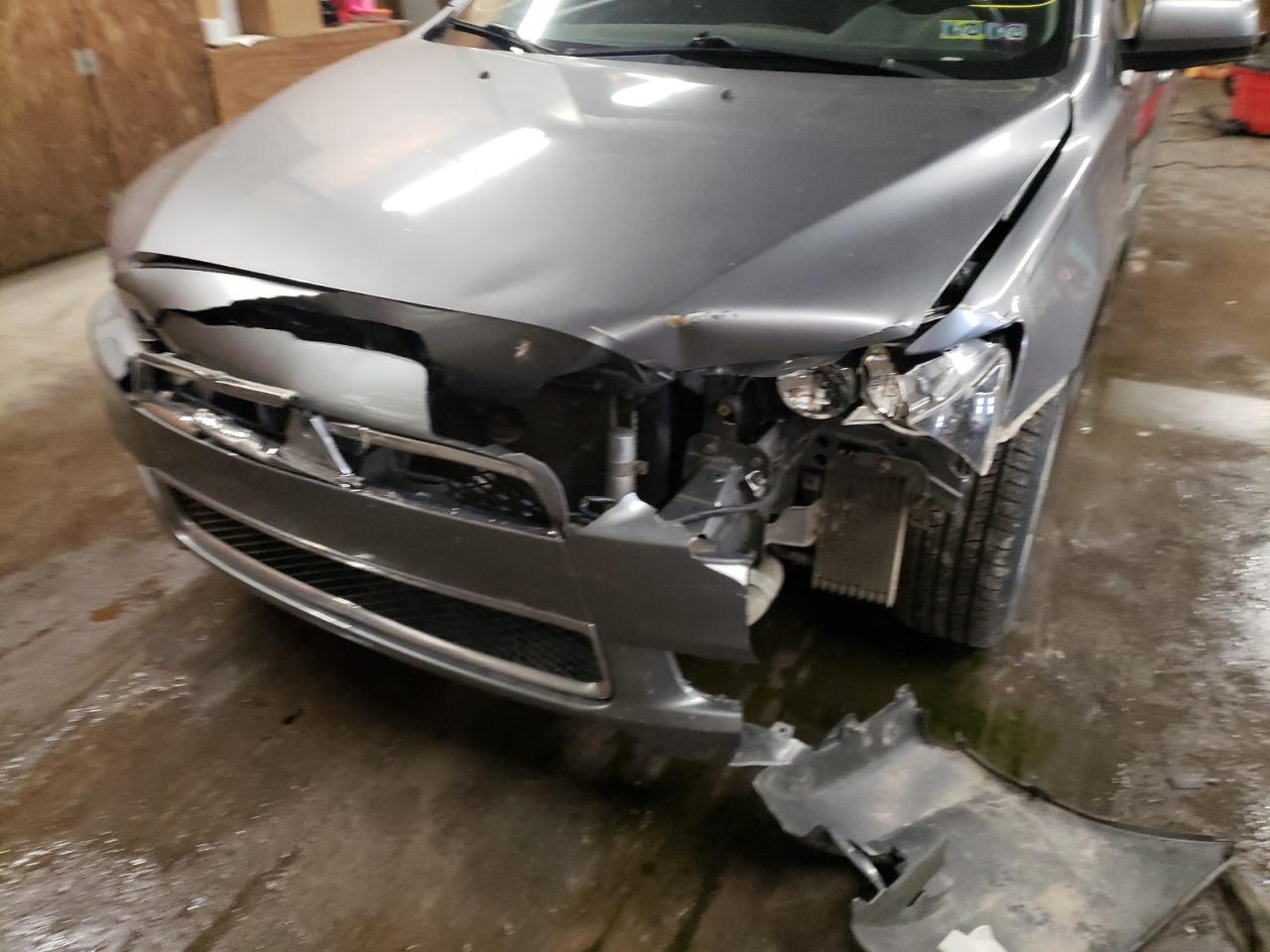 Photo 9 from auction – 2014 MITSUBISHI LANCER SE with VIN JA32V2FW5EU008580