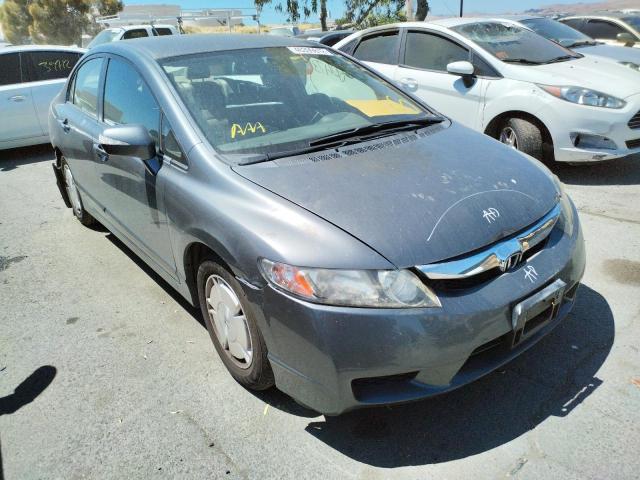 HONDA CIVIC HYBR 2011 with VIN JHMFA3F26BS001385 - Photo from auction