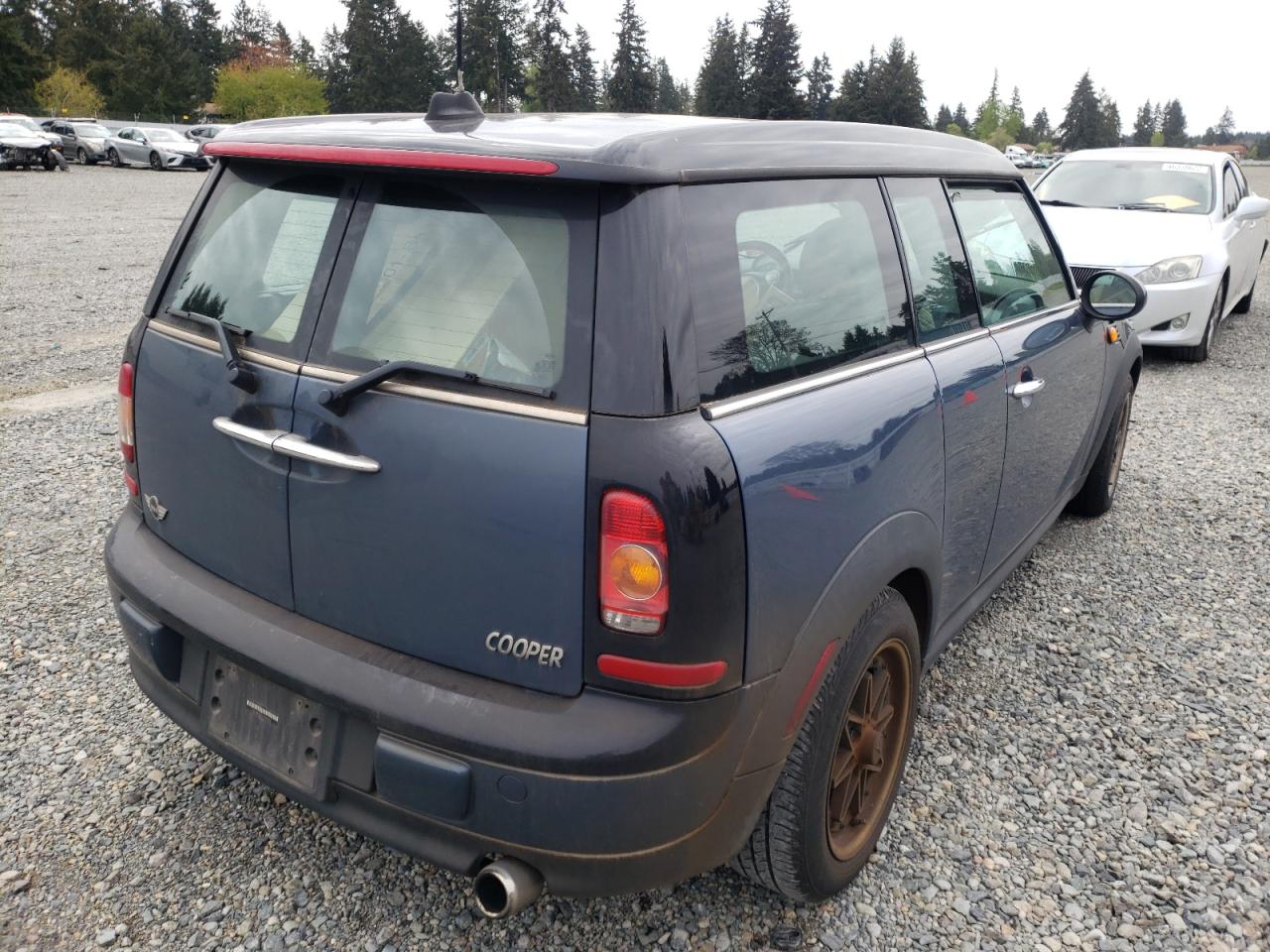 Photo 4 from auction – 2009 MINI COOPER CLU with VIN WMWML33579TX36136