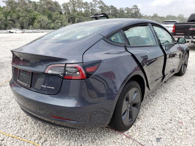 Photo 4 from auction – 2022 TESLA MODEL 3 with VIN 5YJ3E1EB0NF236672