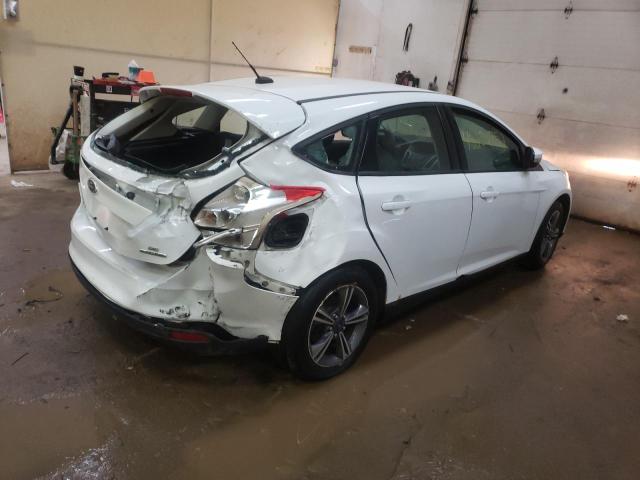 Photo 4 from auction – 2014 FORD FOCUS SE with VIN 1FADP3K25EL220517