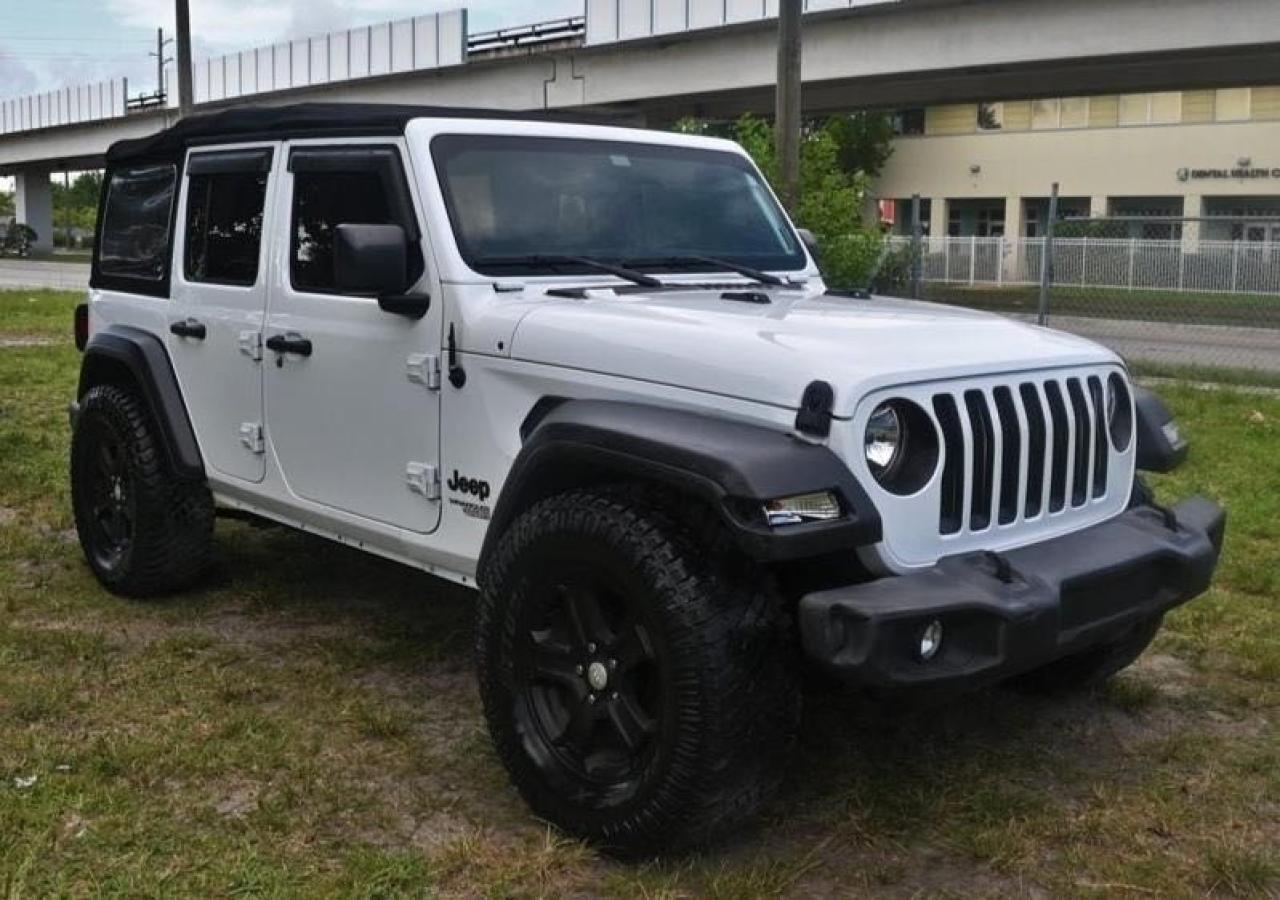 JEEP WRANGLER U 2018 with VIN 1C4HJXDG9JW157850 - Photo from auction