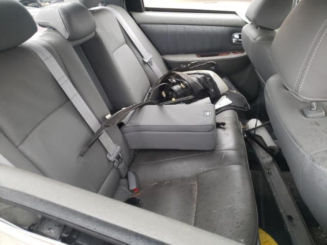 Photo 6 from auction – 2004 KIA OPTIMA with VIN KNAGD128745296572