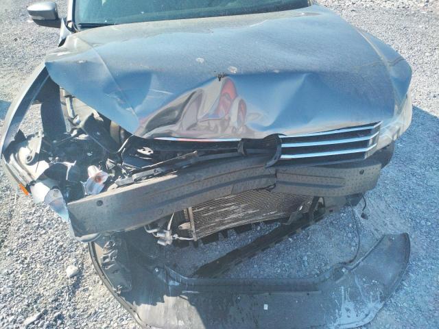 Photo 9 from auction – 2015 VOLKSWAGEN PASSAT S with VIN 1VWAT7A37FC123022