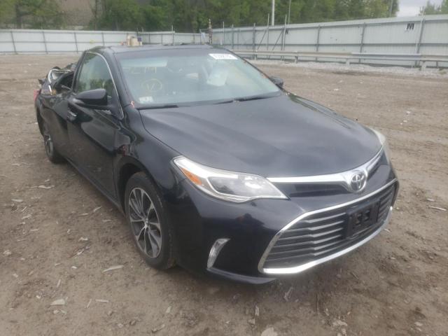 TOYOTA AVALON XLE 2016 with VIN 4T1BK1EB0GU199844 - Photo from auction