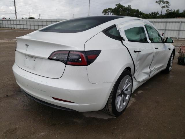 Photo 4 from auction – 2021 TESLA MODEL 3 with VIN 5YJ3E1EA5MF990852