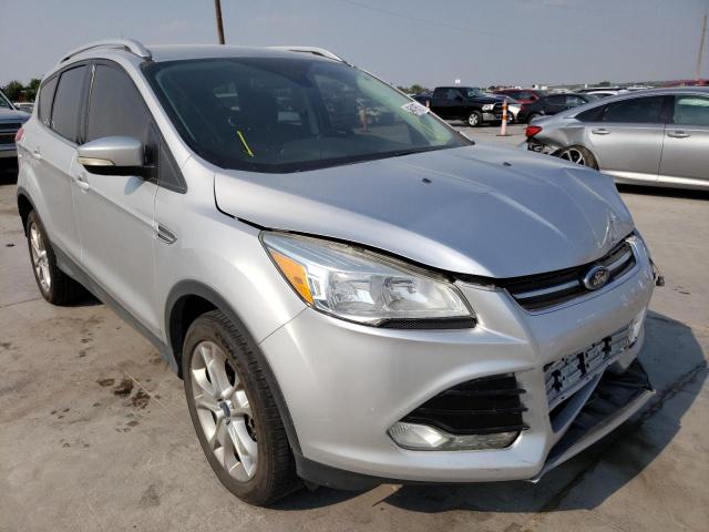 FORD ESCAPE TIT 2014 with VIN 1FMCU0J96EUE51329 - Photo from auction