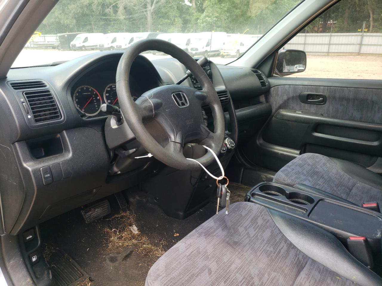 Photo 9 from auction – 2002 HONDA CR-V LX with VIN JHLRD68402C015561