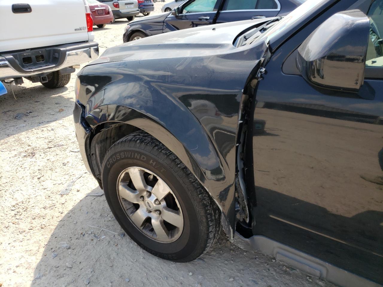Photo 9 from auction – 2011 FORD ESCAPE LIM with VIN 1FMCU9E75BKB75181