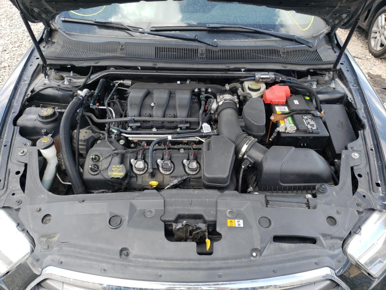Photo 7 from auction – 2014 FORD TAURUS SEL with VIN 1FAHP2H82EG121623