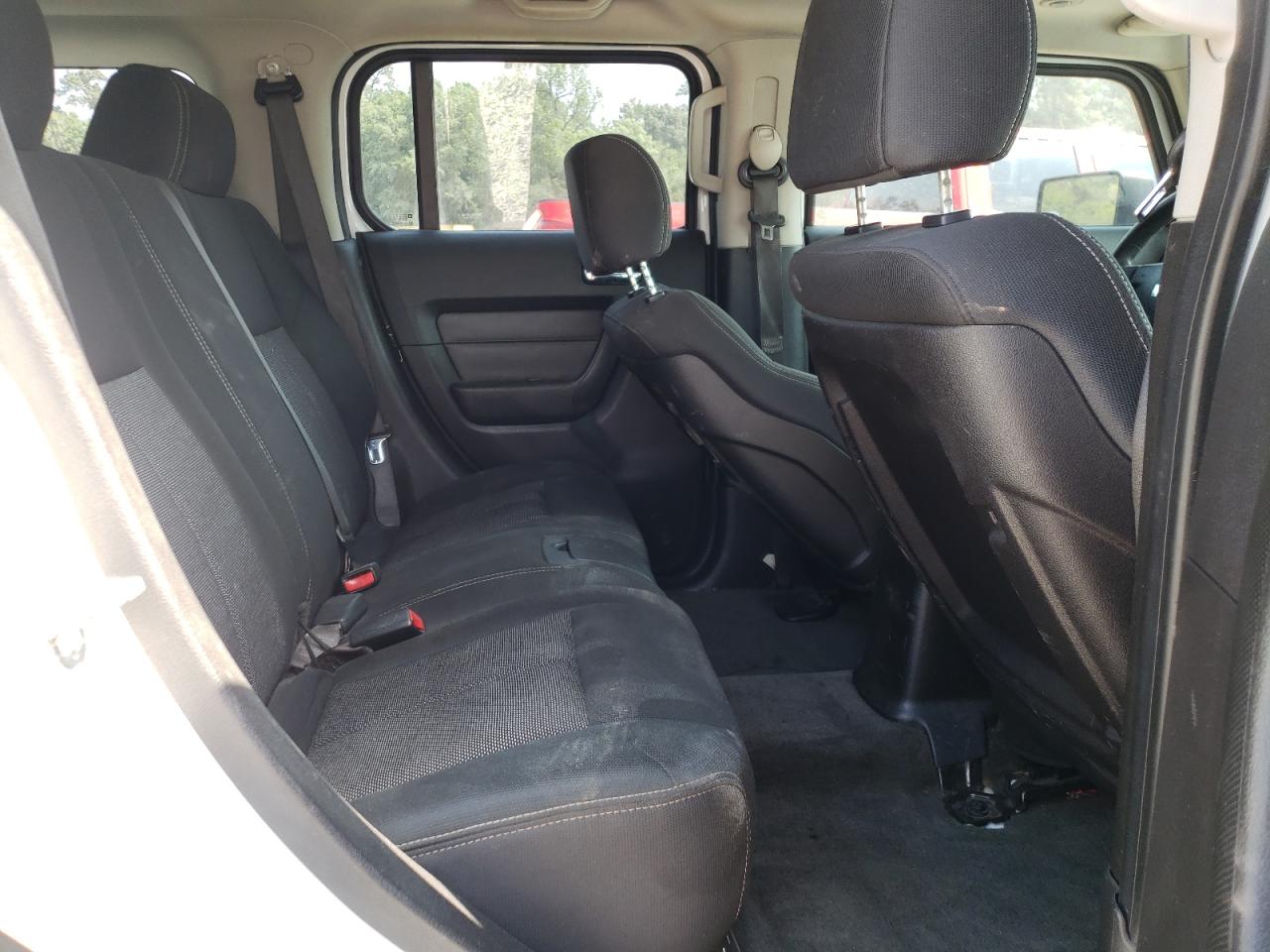 Photo 6 from auction – 2007 HUMMER H3 with VIN 5GTDN13EX78203112